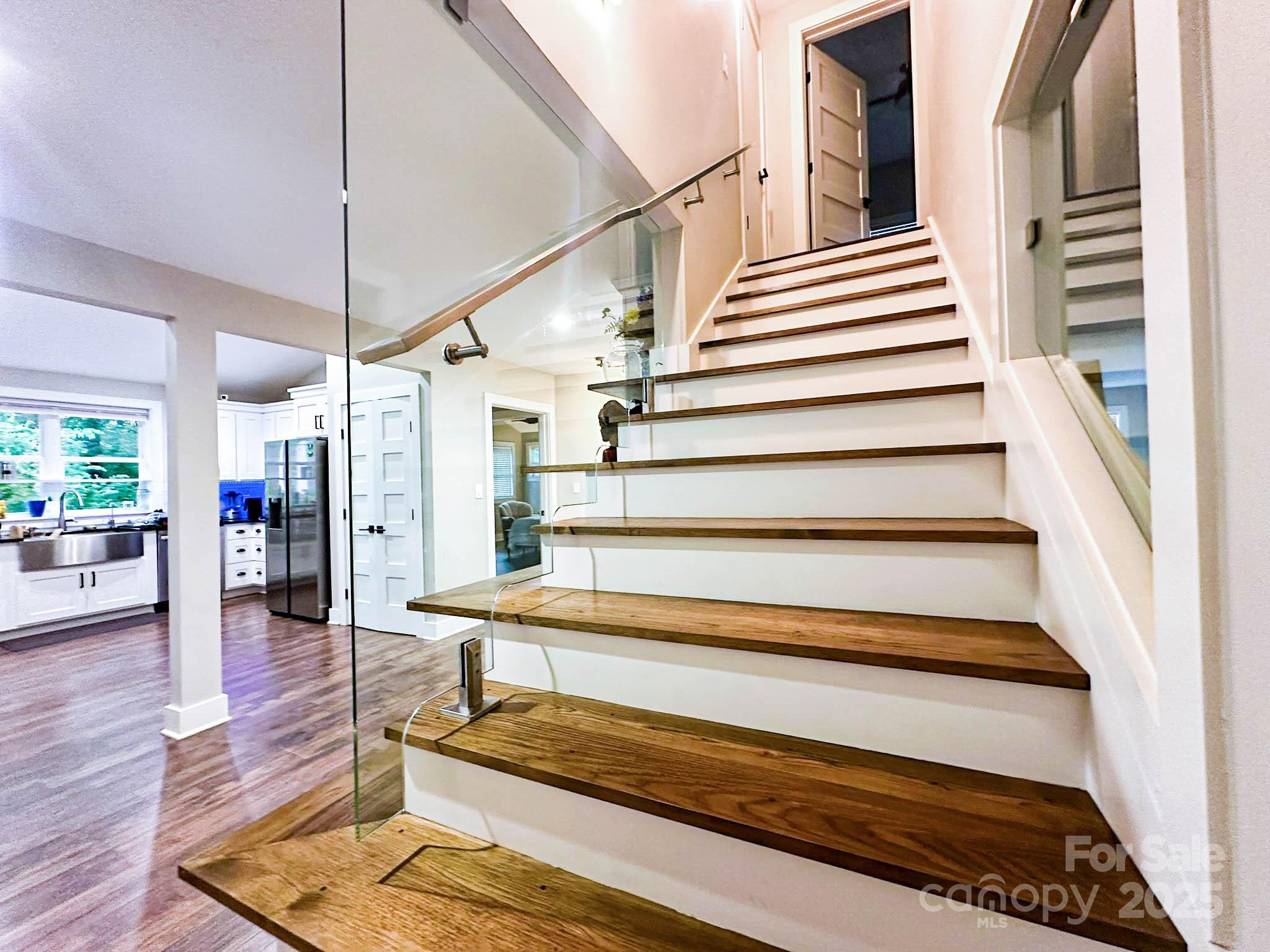 141 Carnegie Road Rutherfordton, NC 28139 - Photo 5 of 48 a view of entryway with wooden floor and a potted plant