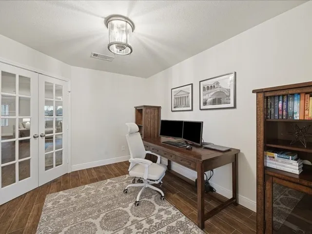 a workspace with furniture and window