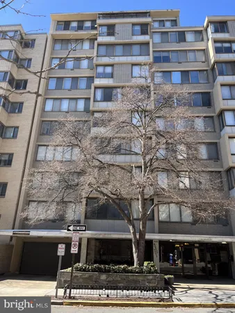 a view of a building with a street