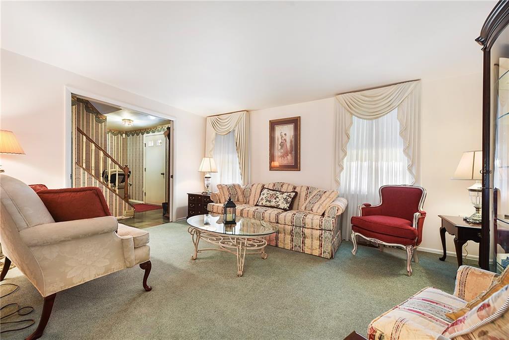 159 Pinehurst Drive Freedom, PA 15042 - Photo 16 of 33 a living room with furniture and a large window