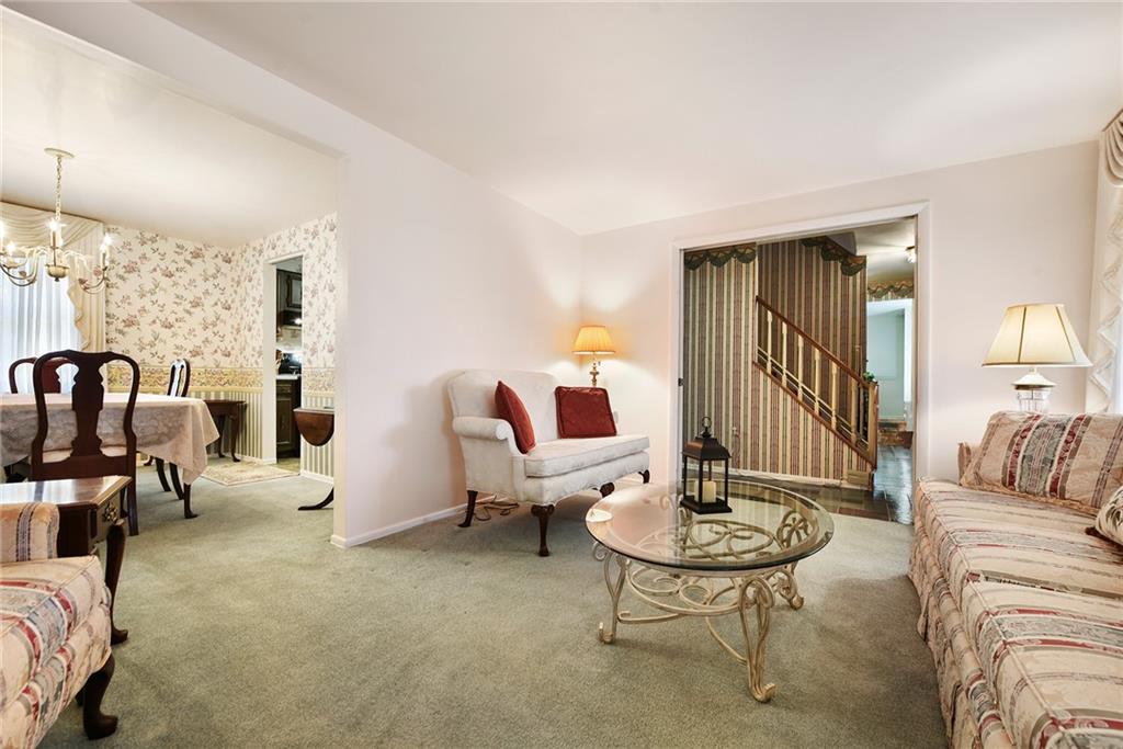 159 Pinehurst Drive Freedom, PA 15042 - Photo 17 of 33 a living room with furniture and a table