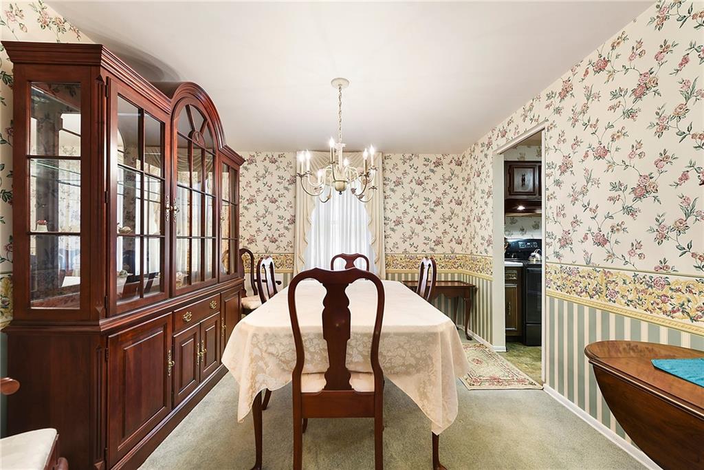 159 Pinehurst Drive Freedom, PA 15042 - Photo 18 of 33 a dining room with furniture and chandelier