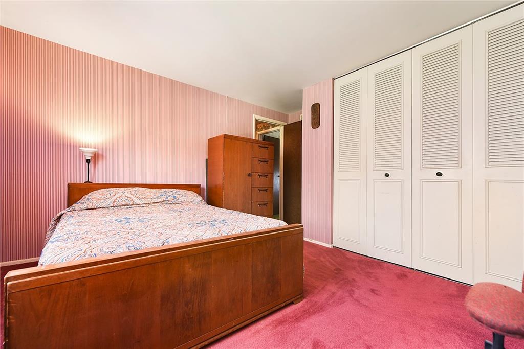 159 Pinehurst Drive Freedom, PA 15042 - Photo 24 of 33 a room with a bed and a mirror