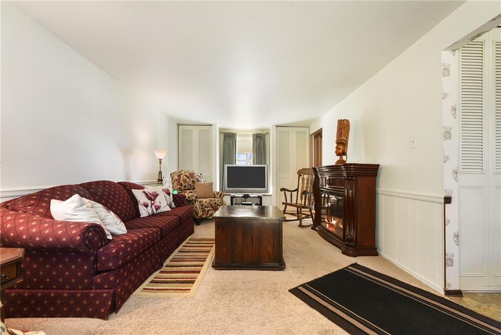 159 Pinehurst Drive Freedom, PA 15042 - Photo 3 of 33 a living room with furniture and a flat screen tv