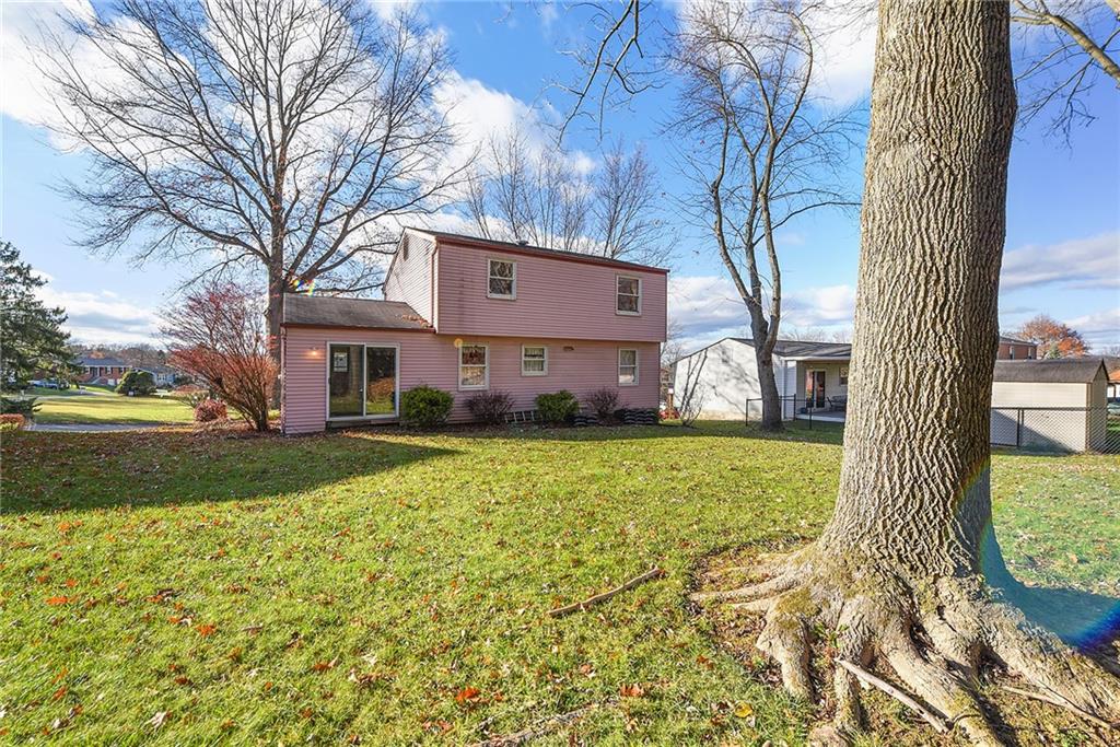159 Pinehurst Drive Freedom, PA 15042 - Photo 32 of 33 a front view of a house with garden