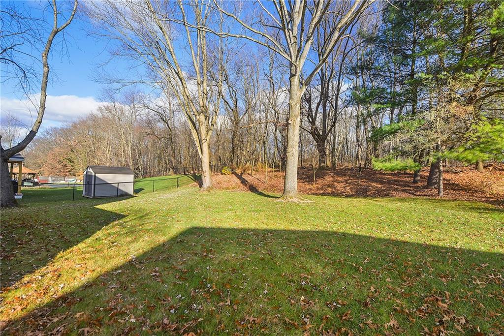159 Pinehurst Drive Freedom, PA 15042 - Photo 33 of 33 a view of a backyard with large tree