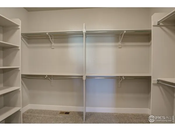 a picture of a room with shelf