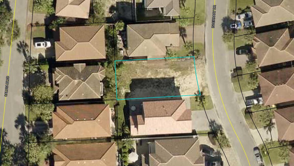 Lot 9 Inverrary Drive Destin, FL 32541 - Photo 1 of 3 an aerial view of a house with swimming pool and sitting space