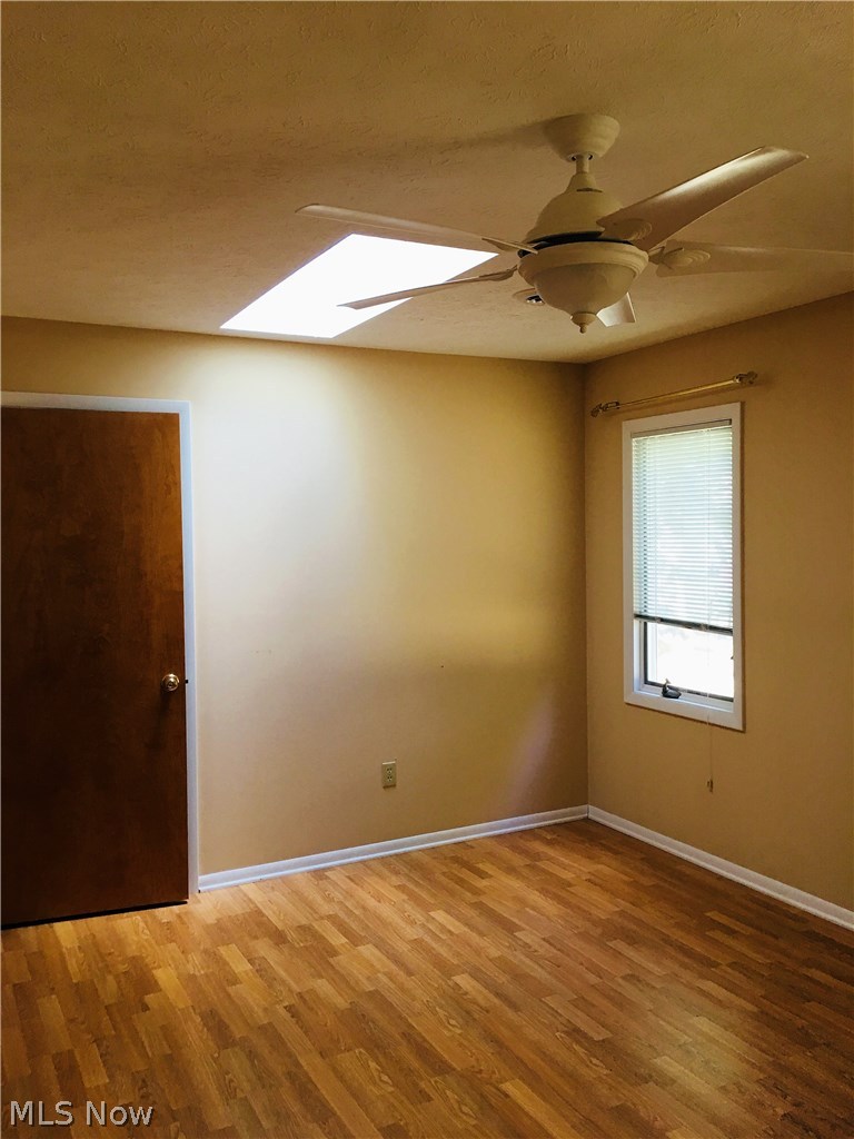 11695 Prospect Road Strongsville, OH 44149 - Photo 10 of 28 master bedroom with skylight