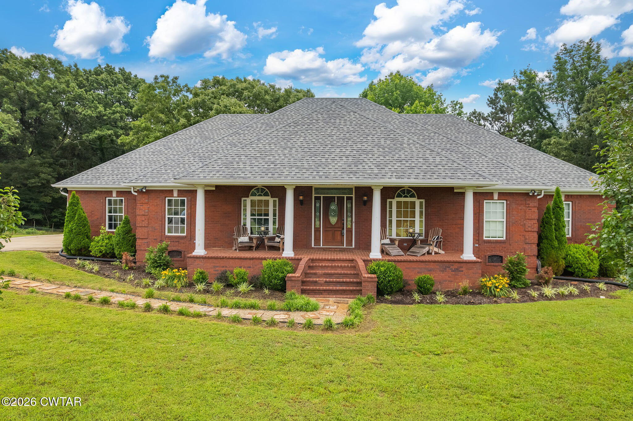 4320 Timberlake-Wildersville Road Lexington, TN 38351 - Photo 1 of 58 front view of a house with a yard