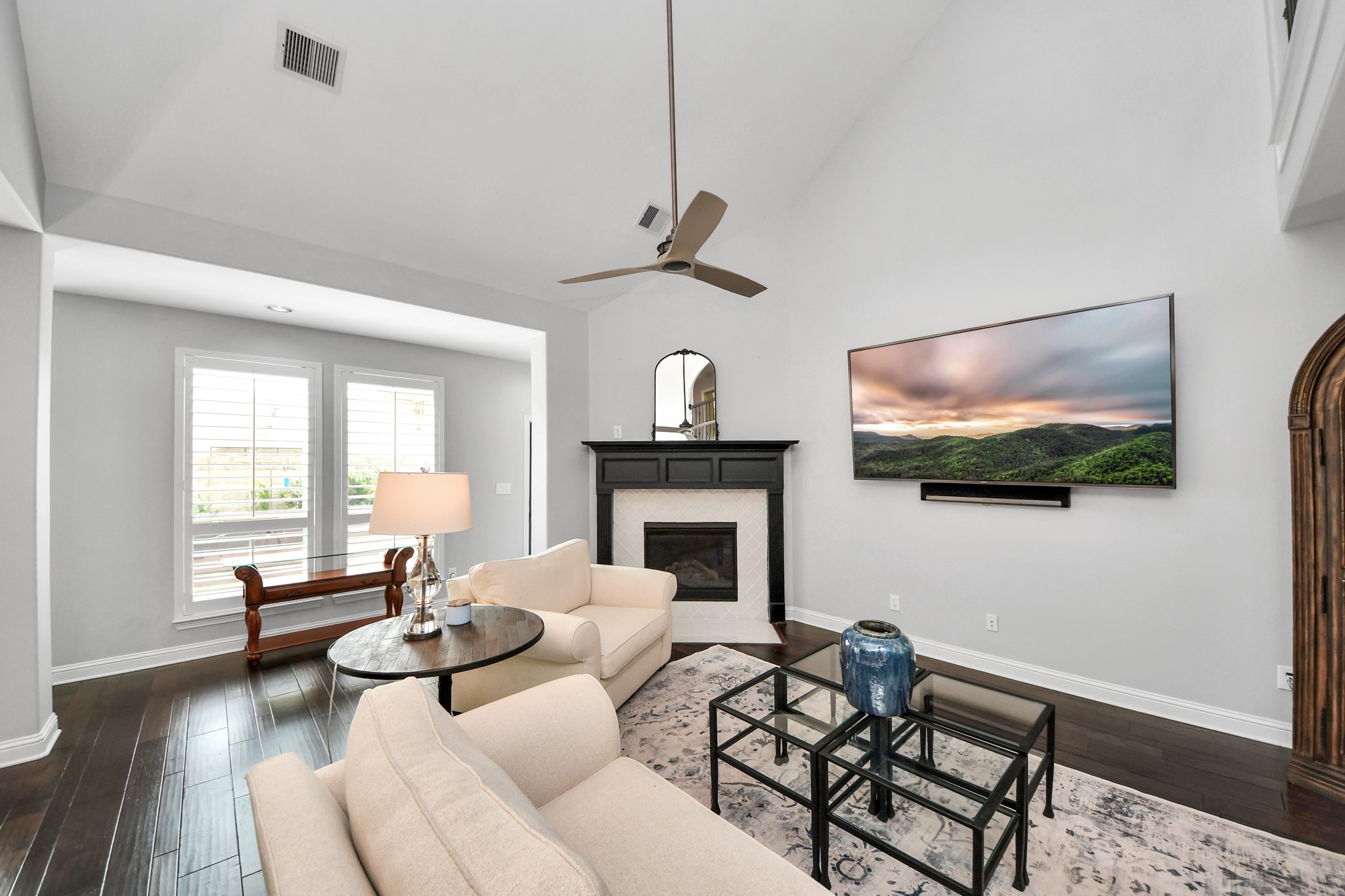 2811 Hadley Springs Lane Spring, TX 77386 - Photo 14 of 50 a living room with furniture a flat screen tv and a fireplace