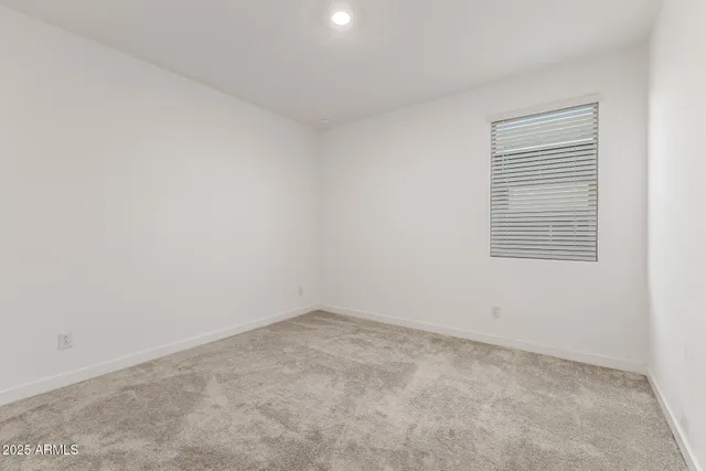 an empty room with cabinet