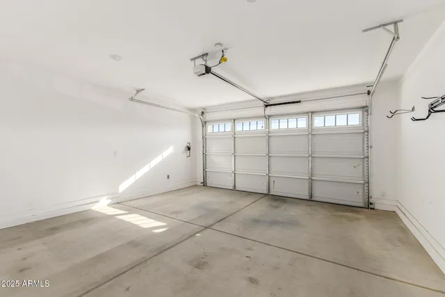 a view of a blue house with a porch