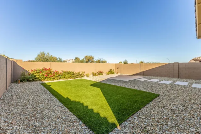 a house with garden in front of it