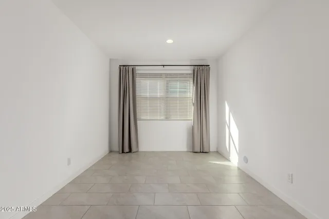 an empty room with window