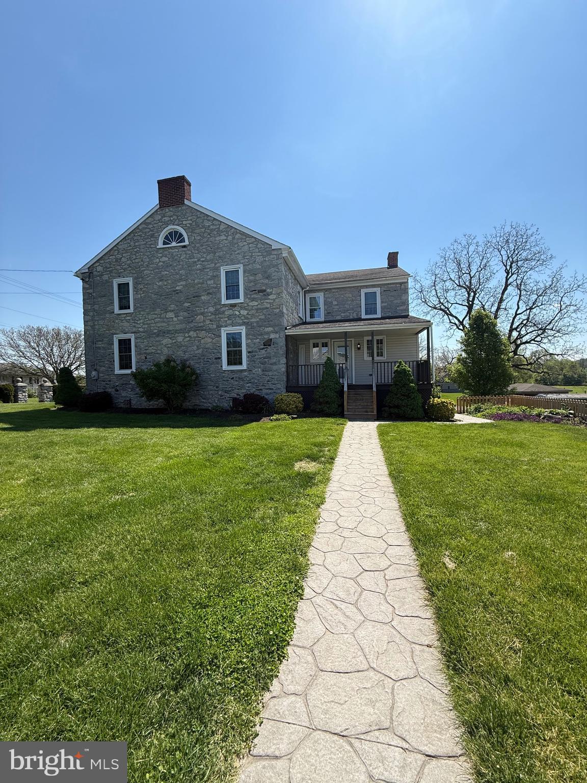 4056 East Newport Road Kinzers, PA 17535 - Photo 16 of 20 a front view of a house with yard