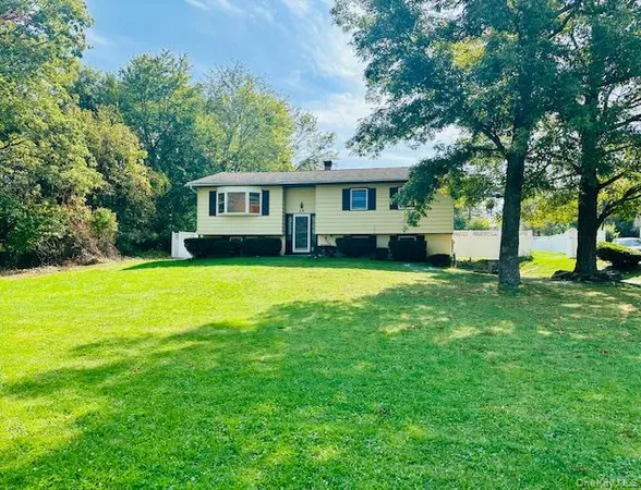a view of a house with a big yard