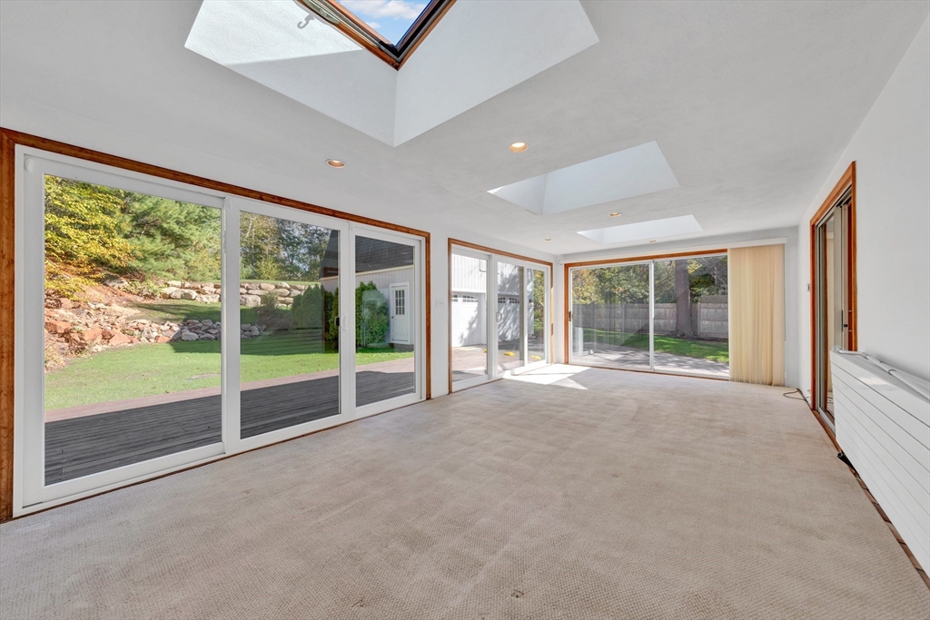 50 Laurel Street Gloucester, MA 01930 - Photo 24 of 40 a view of an empty room with wooden floor and a window