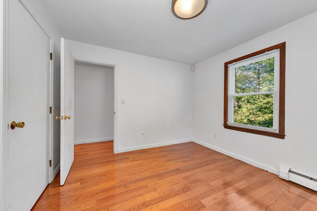 50 Laurel Street Gloucester, MA 01930 - Photo 29 of 40 a view of empty room with wooden floor