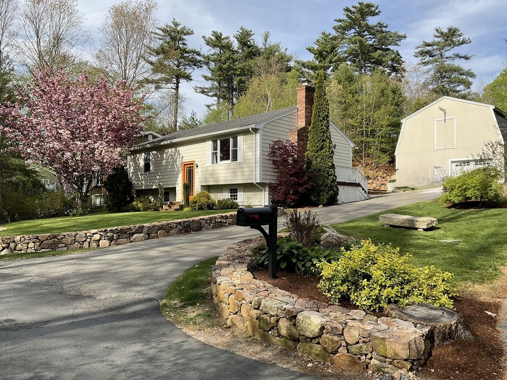 50 Laurel Street Gloucester, MA 01930 - Photo 34 of 40 a front view of a house with a yard