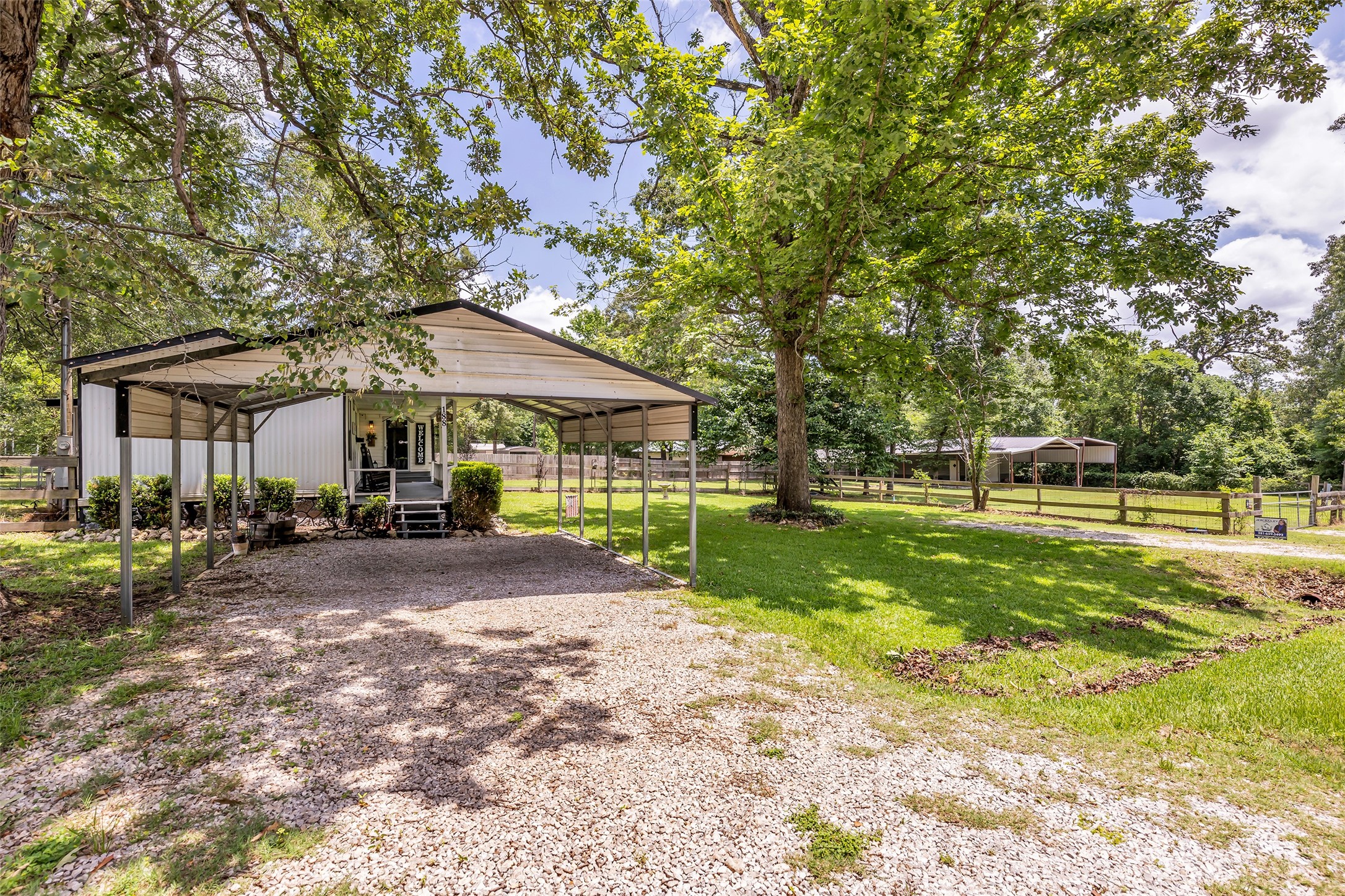 188 Chrissy Lane Trinity, TX 75862 - Photo 2 of 25 a front view of a house with a yard