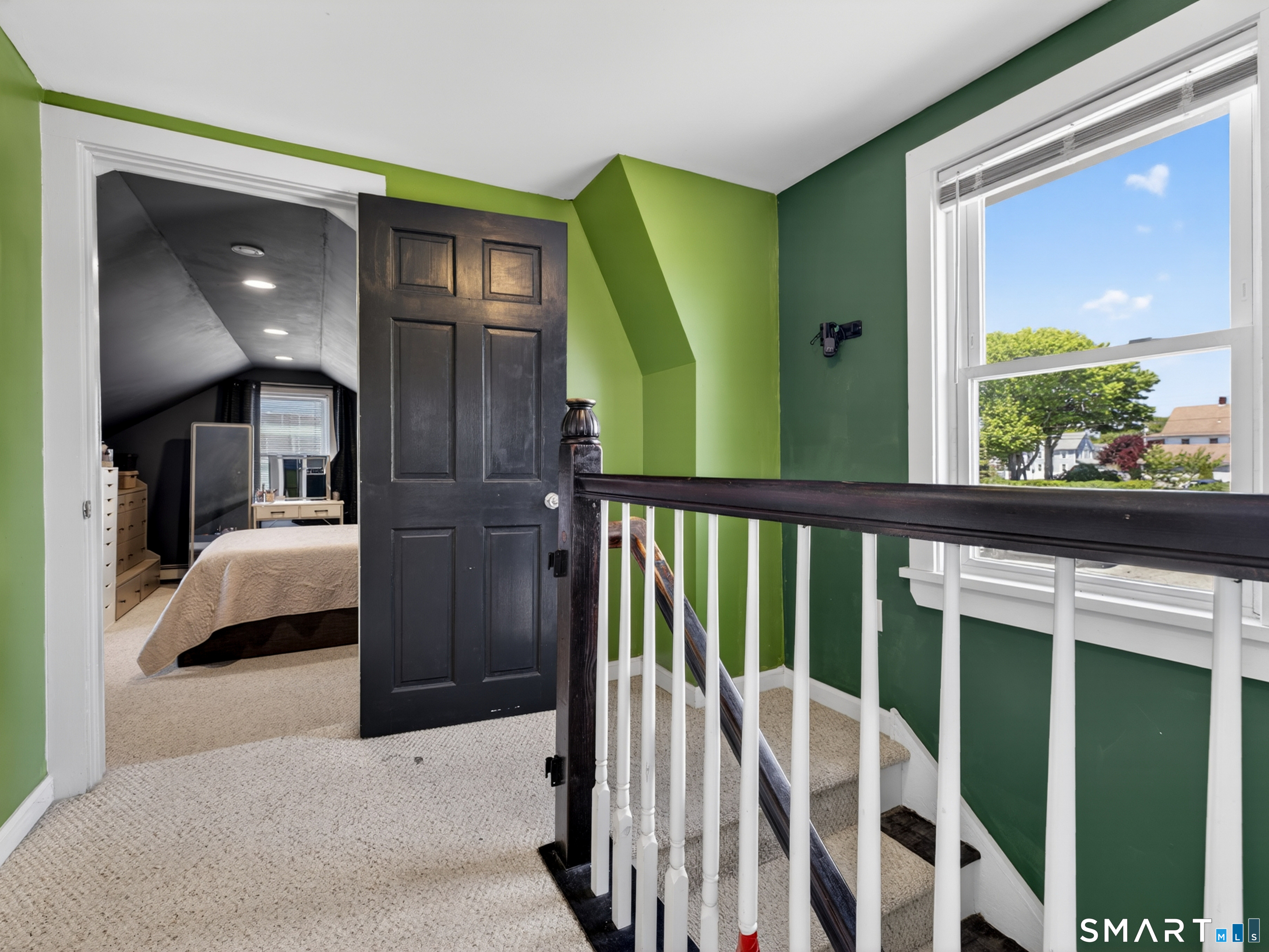 13 Oak Street Groton, CT 06340 - Photo 18 of 38 a view of a bedroom from a balcony