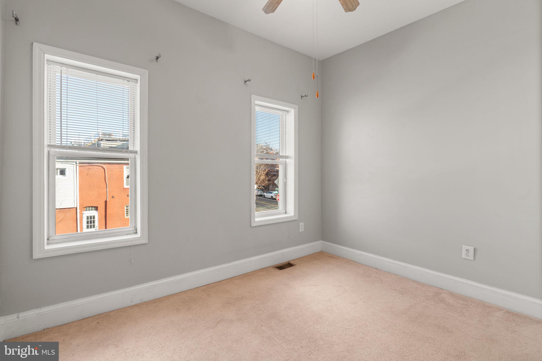 1456 Battery Avenue Baltimore, MD 21230 - Photo 16 of 31 an empty room with windows