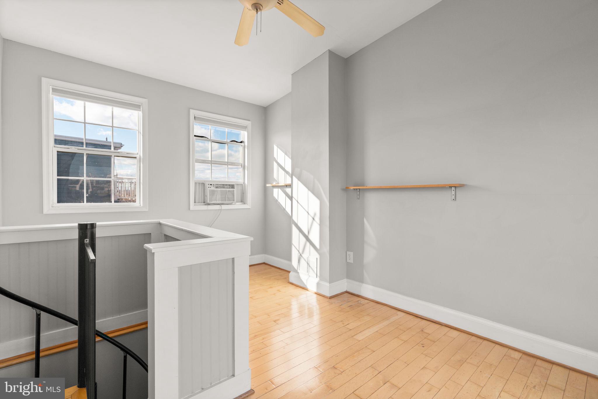1456 Battery Avenue Baltimore, MD 21230 - Photo 20 of 31 a view of an empty room with a window