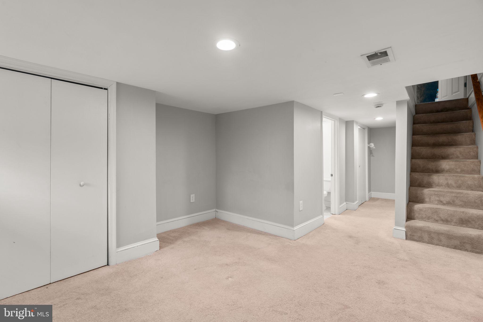 1456 Battery Avenue Baltimore, MD 21230 - Photo 23 of 31 a view of an empty room with stairs