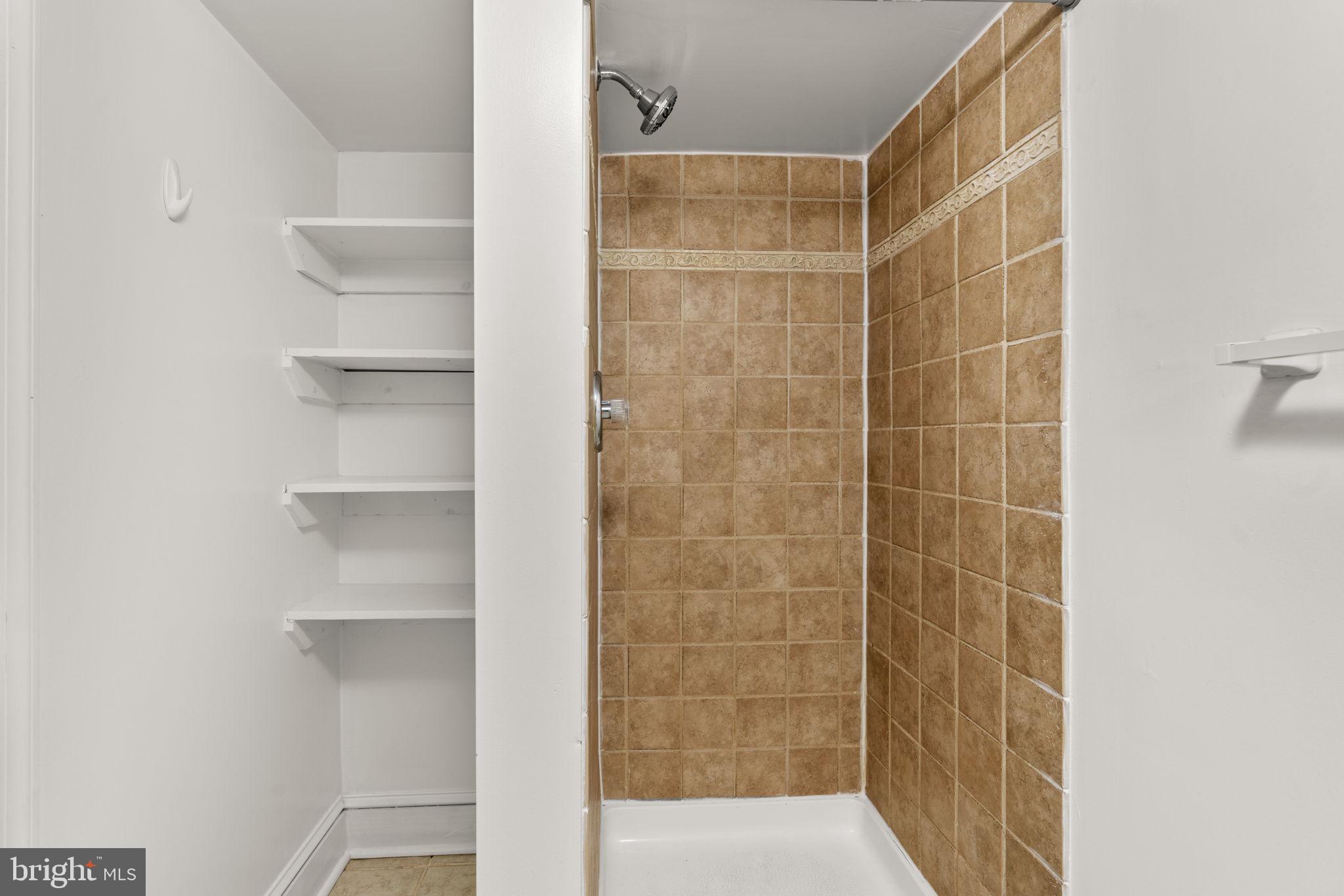 1456 Battery Avenue Baltimore, MD 21230 - Photo 25 of 31 a bathroom with a shower