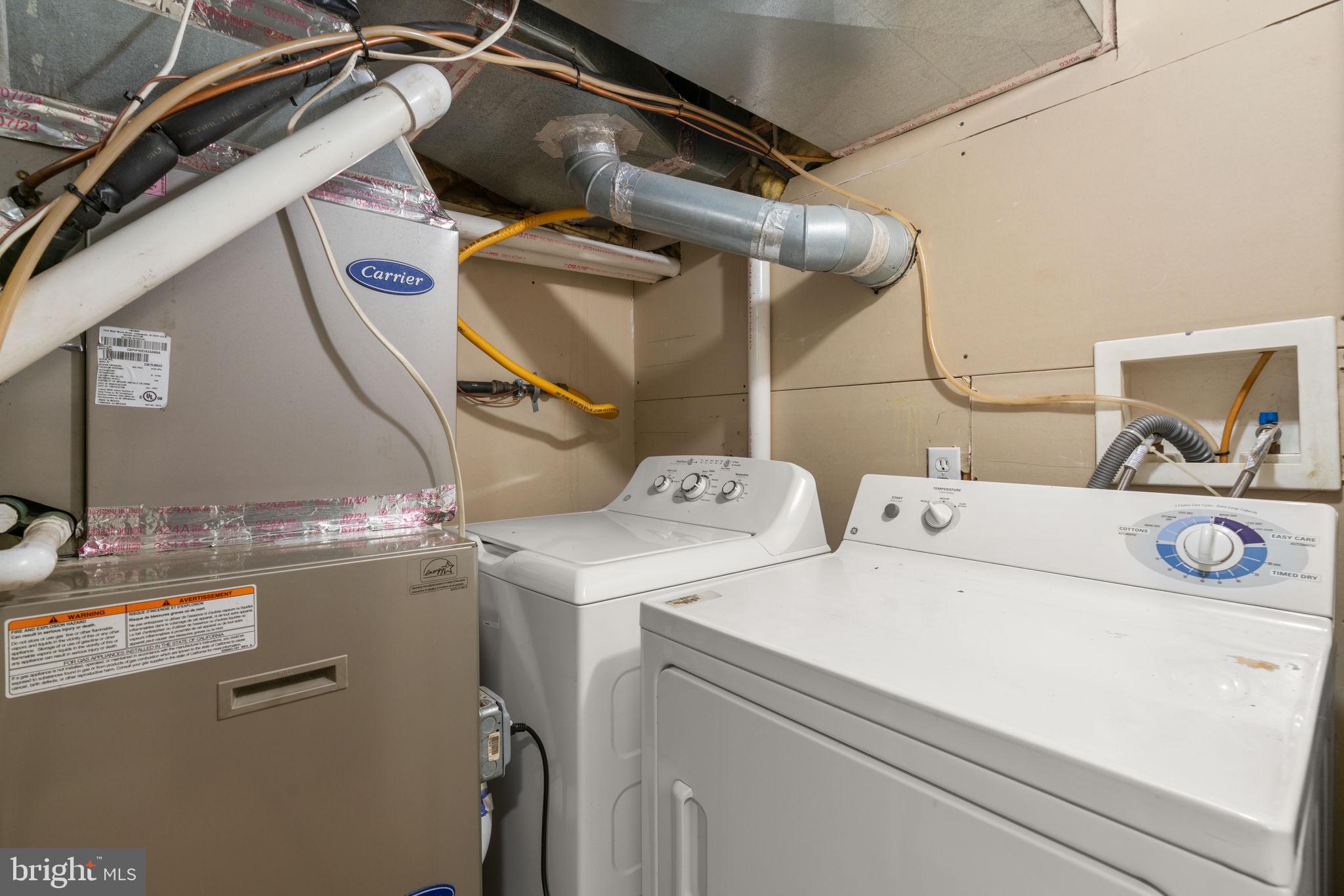 1456 Battery Avenue Baltimore, MD 21230 - Photo 26 of 31 a utility room with dryer and washer