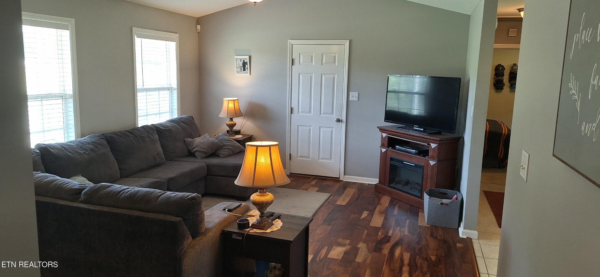 6199 Sinking Creek Road Greenback, TN 37742 - Photo 15 of 33 a living room with furniture and a flat screen tv