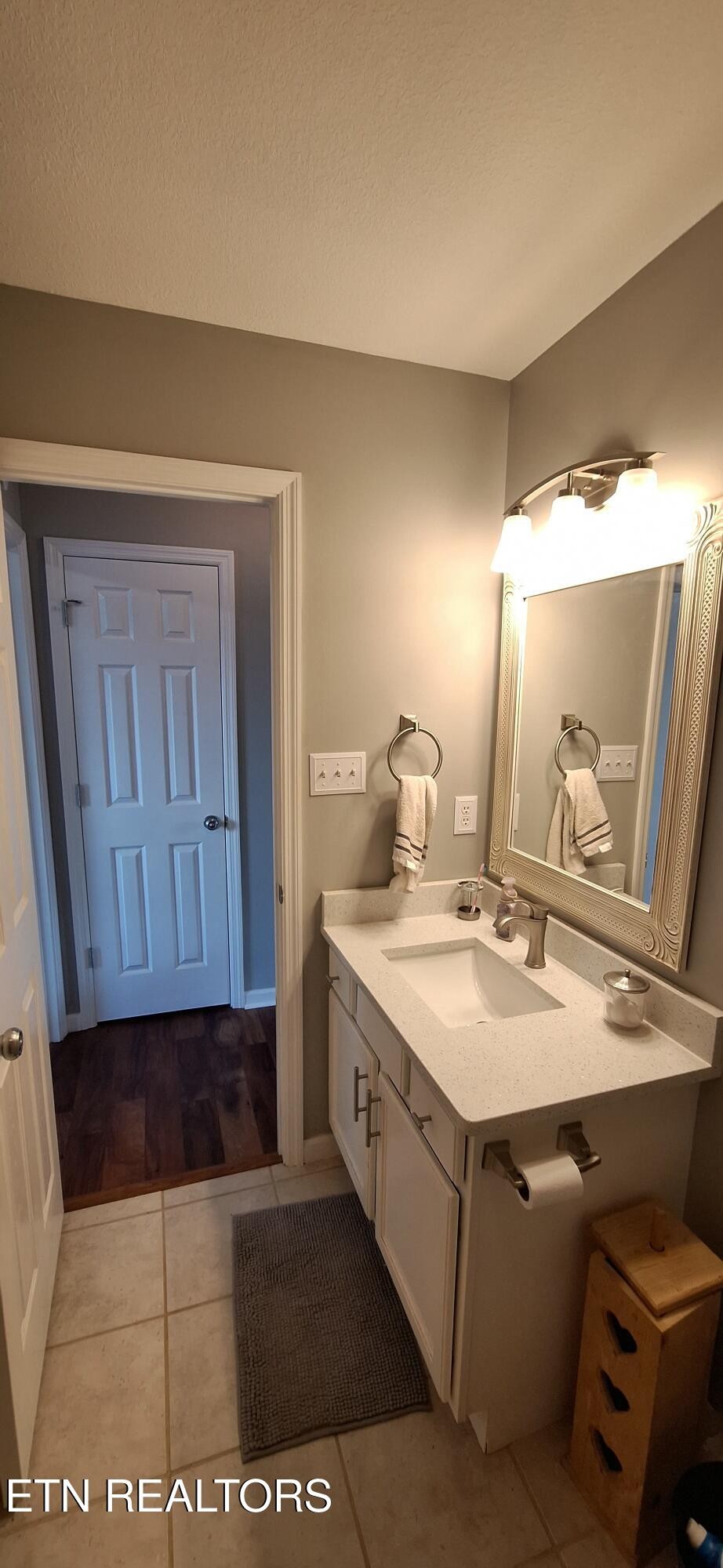 6199 Sinking Creek Road Greenback, TN 37742 - Photo 20 of 33 a bathroom with a sink and a mirror