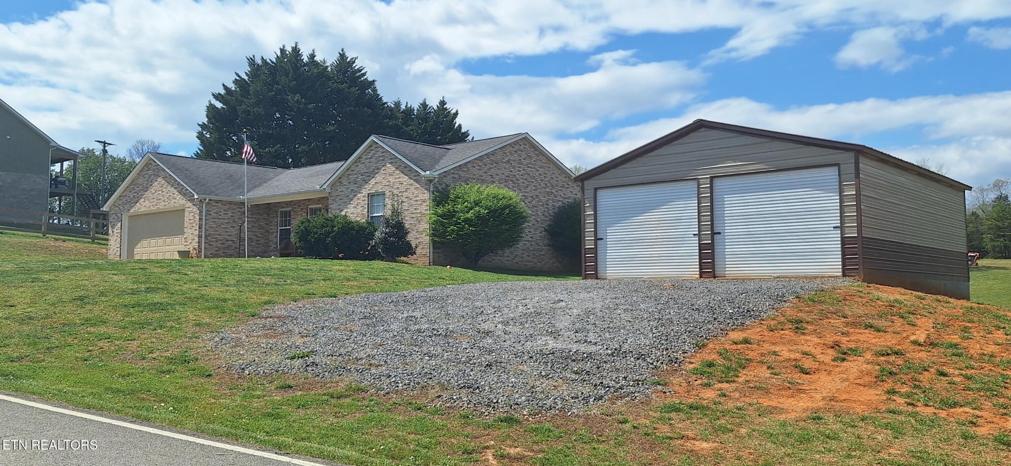 6199 Sinking Creek Road Greenback, TN 37742 - Photo 5 of 33 a view of a house with a yard