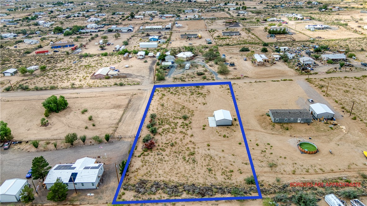 3870 Bouse Road Golden Valley, AZ 86413 - Photo 6 of 29 View of rural area featuring a desert landscape and property parcel outlined