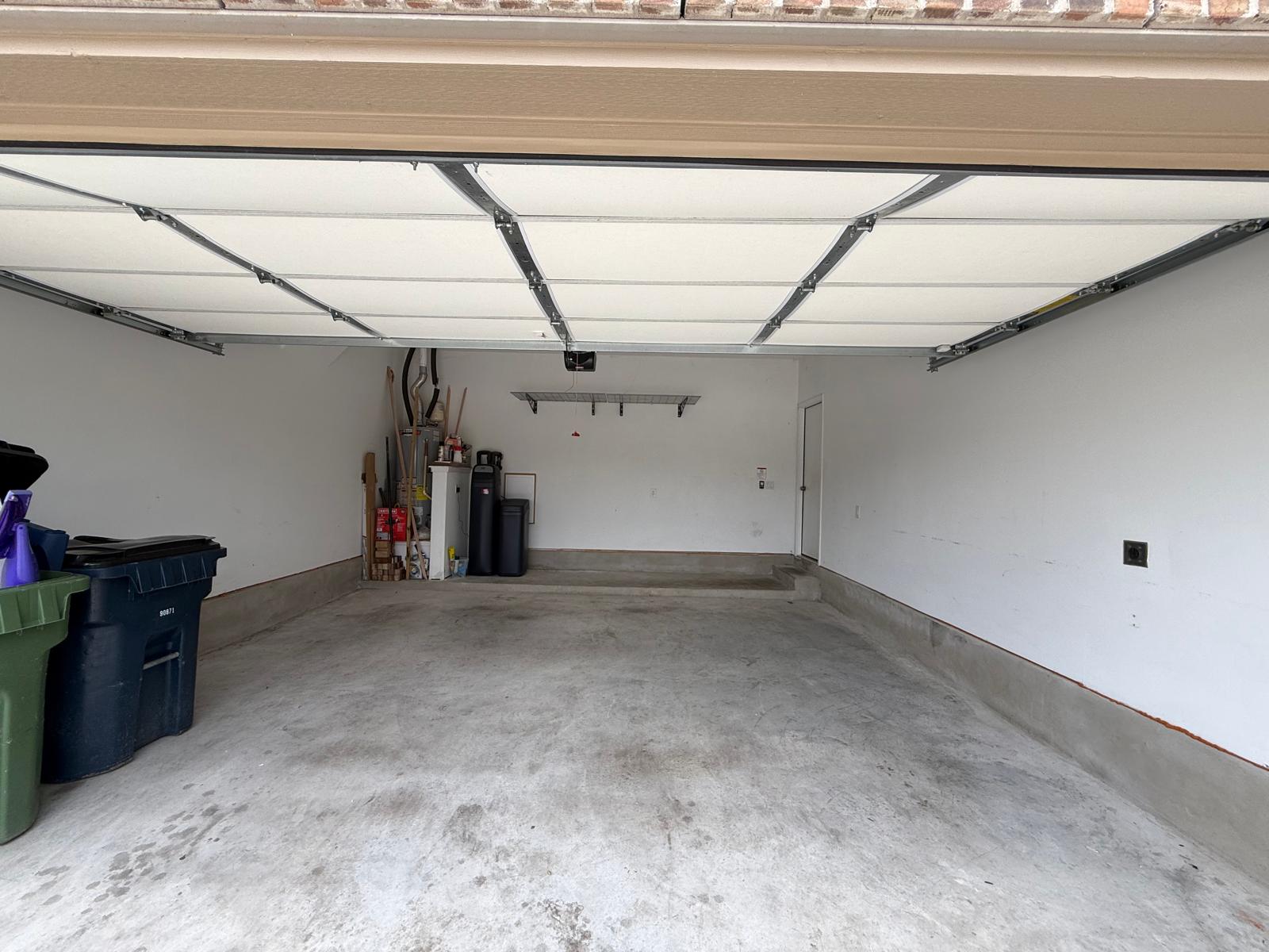 1521 Brueggerhoff Road Leander, TX 78641 - Photo 14 of 15 Concrete floors and high ceilings define this highly functional garage space.