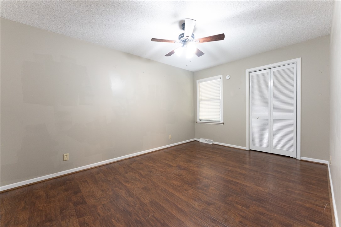 117 Shaftsbury Road Clemson, SC 29631 - Photo 12 of 29 Warm wood flooring pairs with neutral walls in this versatile bedroom.