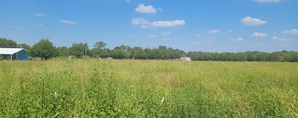 Tbd Holder Road Waxahachie, TX 75165 - Photo 7 of 8 a view of a lake with houses in the back