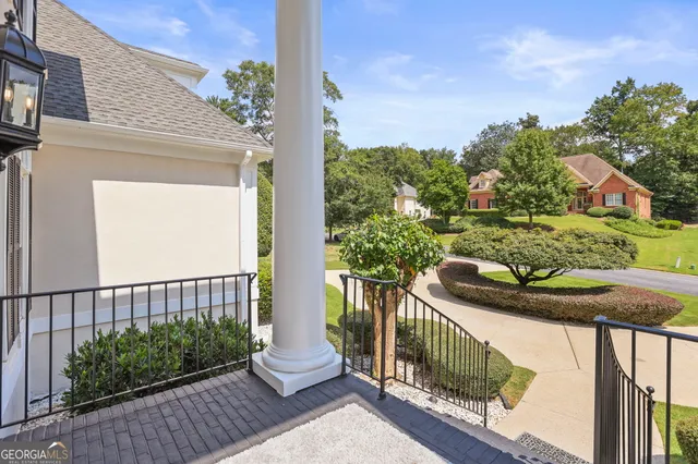 a kitchen with granite countertop a sink and a stove top oven