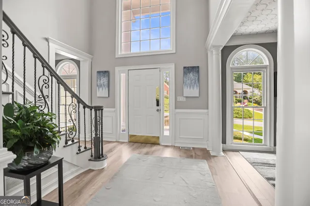 a view of a swimming pool with a yard