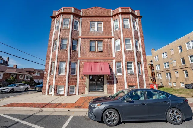 a car parked in front of a building