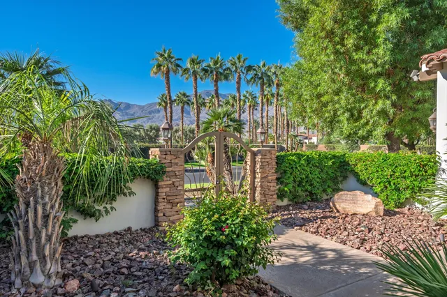 a view of a garden with a fountain