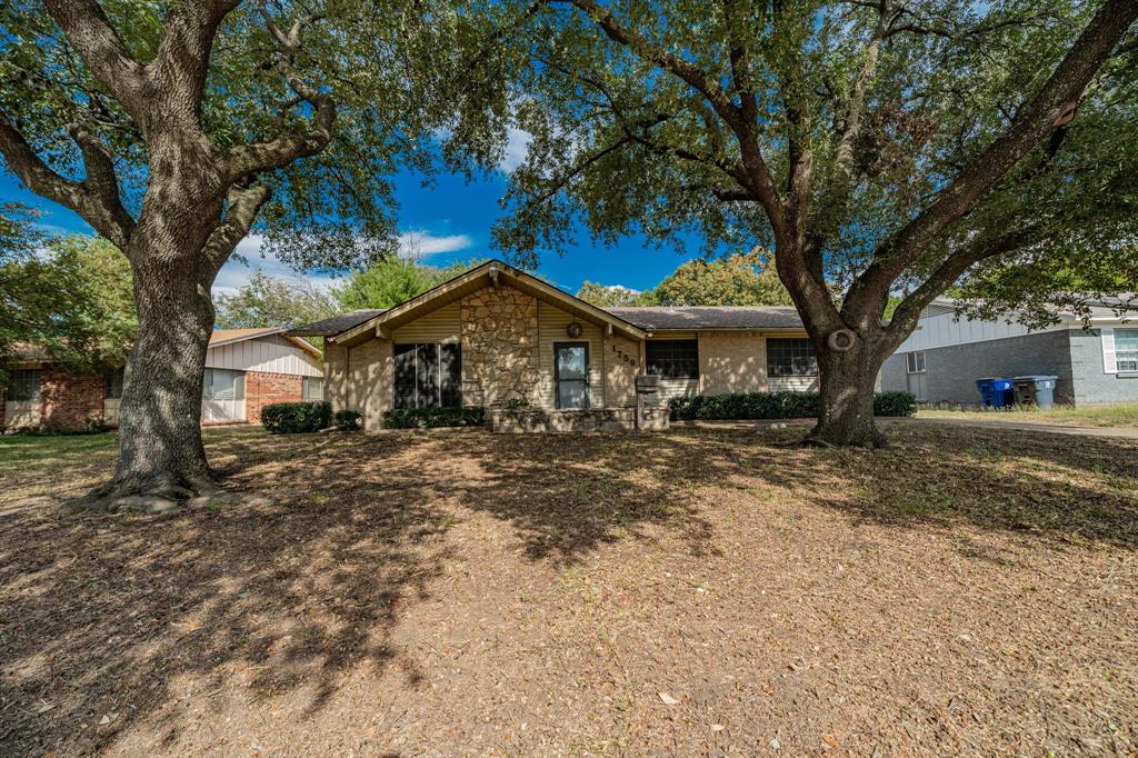 1759 Gross Road Dallas, TX 75228 - Photo 1 of 1 Single story home with brick siding and a front yard