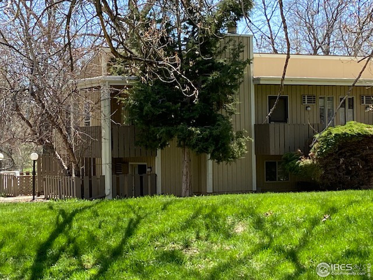 a view of house with backyard