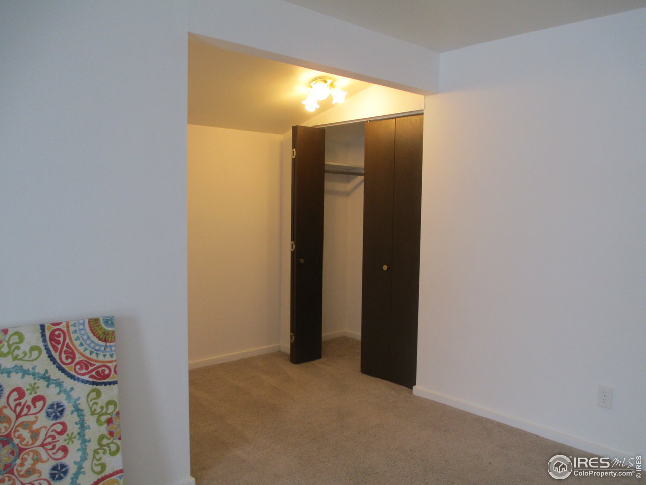 8060 Niwot Road, Unit 12E Niwot, CO 80503 - Photo 15 of 36 a very nice looking room with an empty room