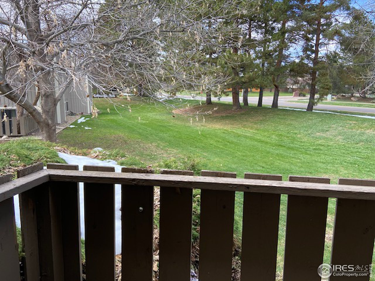 8060 Niwot Road, Unit 12E Niwot, CO 80503 - Photo 19 of 36 a view of backyard with wooden fence