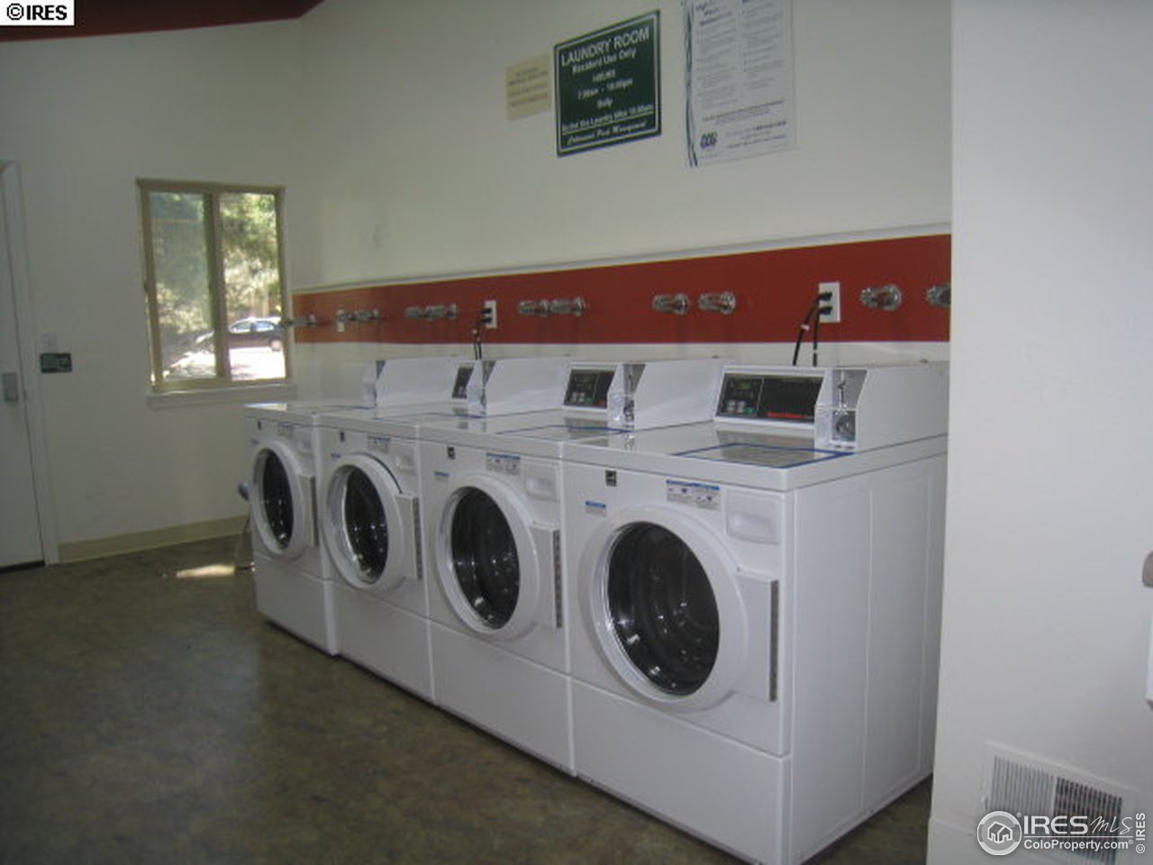 8060 Niwot Road, Unit 12E Niwot, CO 80503 - Photo 27 of 36 a utility room with dryer and washer