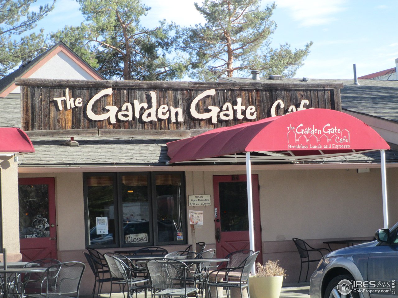 8060 Niwot Road, Unit 12E Niwot, CO 80503 - Photo 31 of 36 an outdoor cafe with a table and chairs