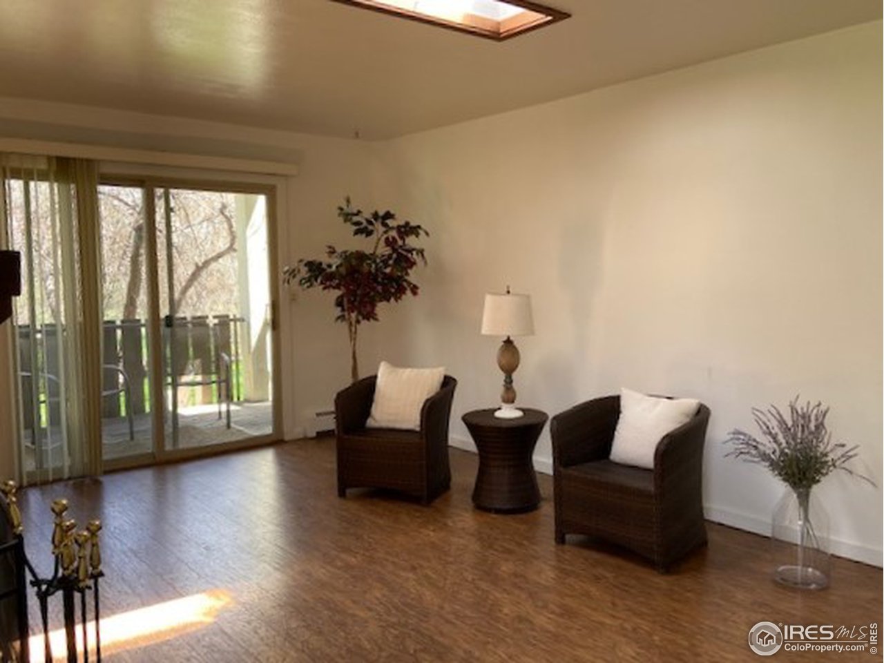 8060 Niwot Road, Unit 12E Niwot, CO 80503 - Photo 6 of 36 a living room with furniture and a large window