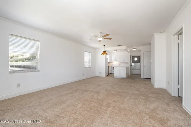 an empty room with a empty space and window